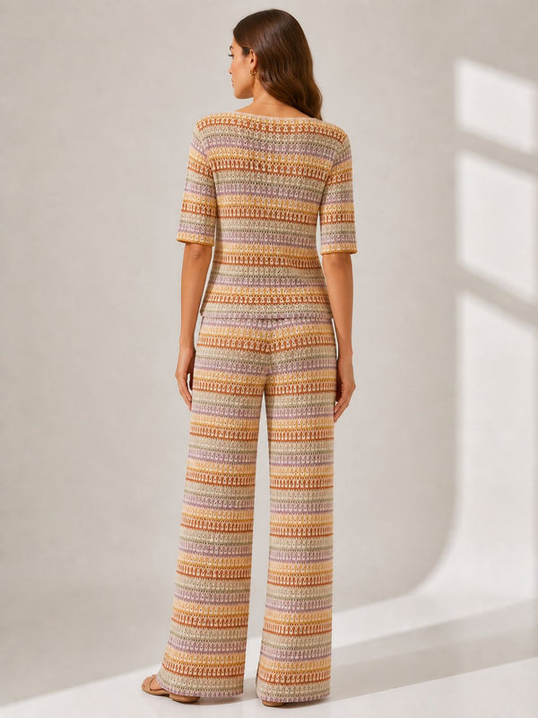 TOP IN MAGLIA TRAFORATA CON SCOLLO A V